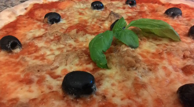 Pizza with tuna and black olives
