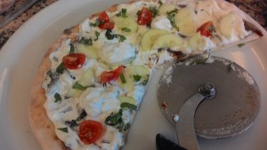 Pizza en el griego Tzatziki