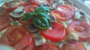 Focaccia with tomato slices Mushrooms and Garlic
