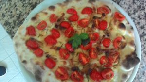 Focaccia with cherry tomatoes and seasoned Pillow