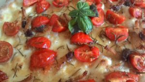 Focaccia with cherry tomatoes and seasoned Pillow