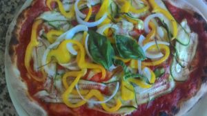 Zucchini Pizza with Peppers and Onions