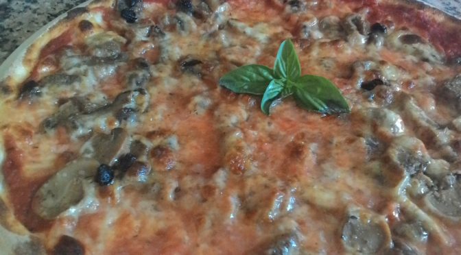 Pizza with mushrooms and raisins Sultana Trifolati