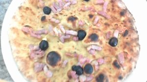 Focaccia Cereals with bacon and black olives