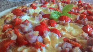 Focaccia with tomatoes and bacon Scamorza