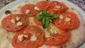 Focaccia With Tomatoes and Garlic Marinated