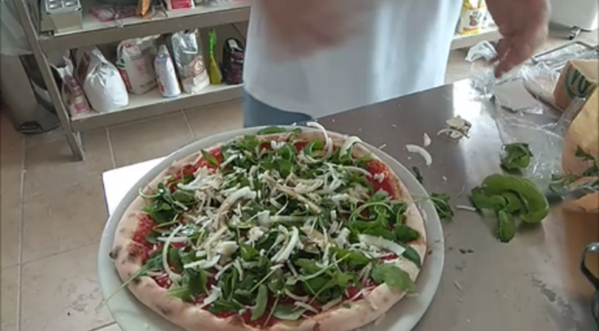 Onion Pizza With Arugula and Parmesan