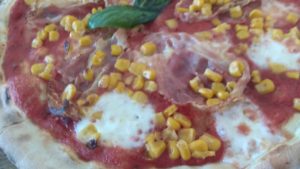 Pizza con tocino y maíz Receta