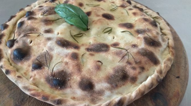 Cerdo relleno de tomate pizza de champiñones y maíz