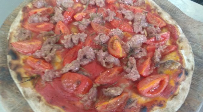 Pizza With Anchovy Cherry Tomatoes and Sausage
