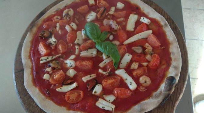 Pizza with Seafood Salad and Cherry Tomatoes